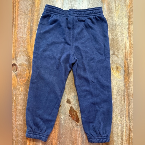 Under Armour Kids Navy Sweatpants with Orange Logo - Picture 3 of 3
